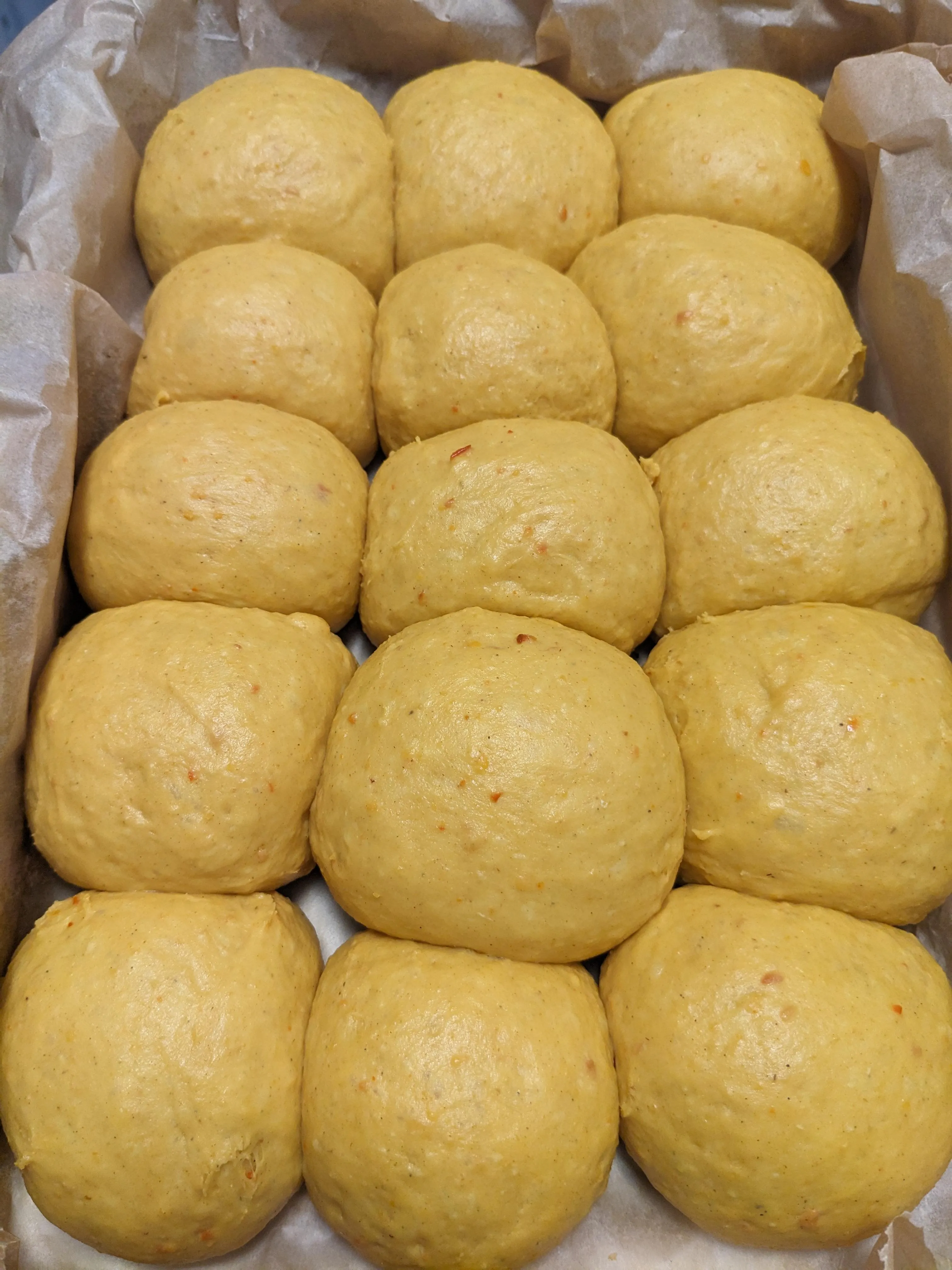 The dough balls after the second rise – puffed up and touching